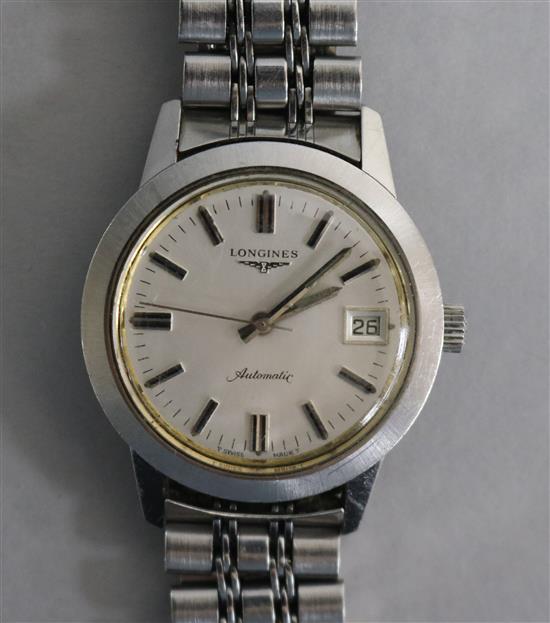 A Longines stainless steel gentlemans automatic wristwatch, with silvered dial, date aperture and baton numerals